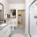 glassed, walk-in shower in bright bathroom