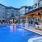 outdoor swimming pool lit at night