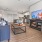 large living room with recessed lighting open to kitchen