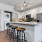 well lit kitchen with island seating